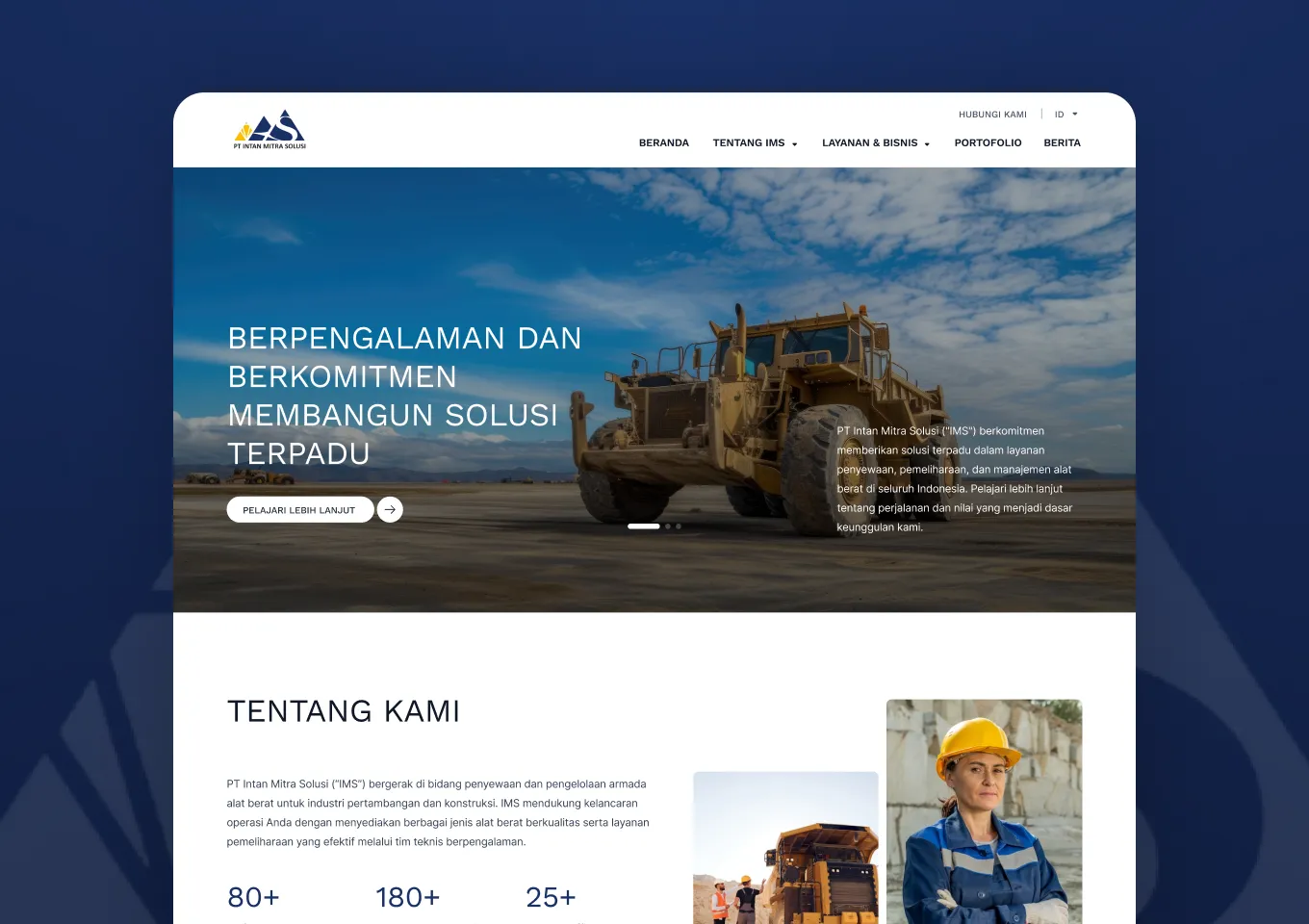 Beranda situs PT Intan Mitra Solusi dengan hero carousel alat berat dan bagian tentang kami